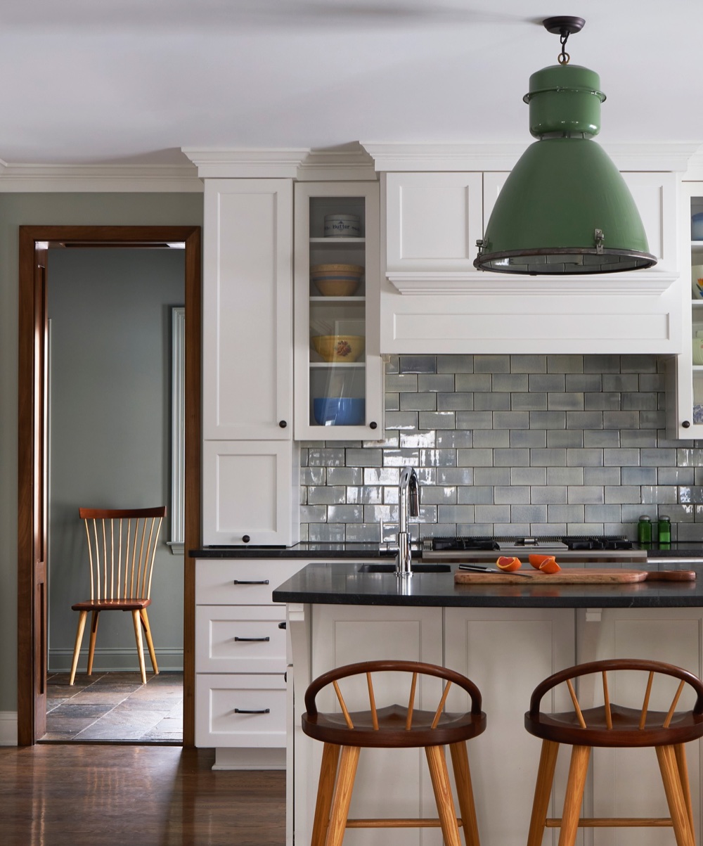 Classic kitchen, white cabinets, iridescent backsplash, green pendant, luxury renovation and interior design by Martire Custom Homes