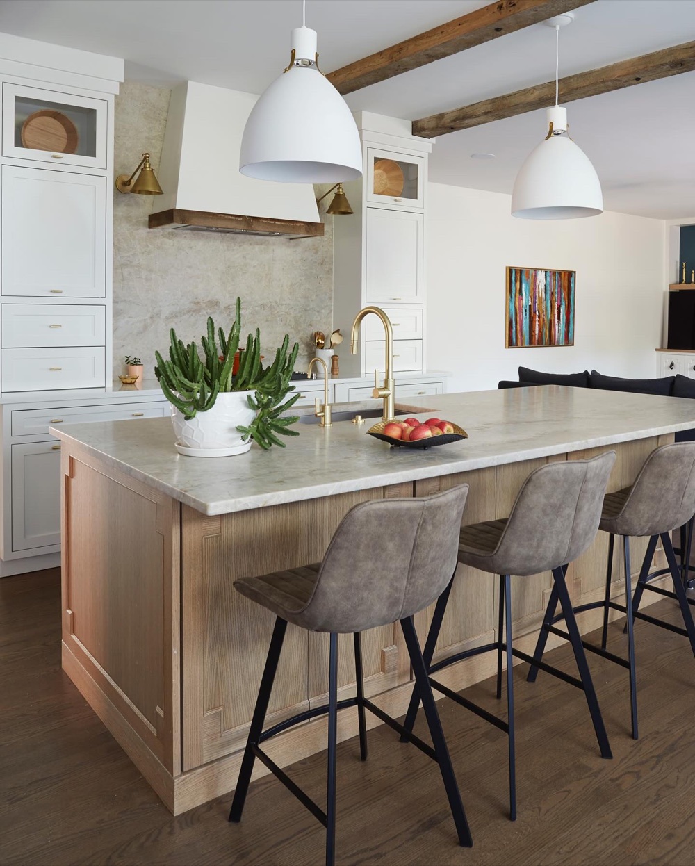 Kitchen with white oak island and marble, luxury renovation and interior design by Martire Custom Homes